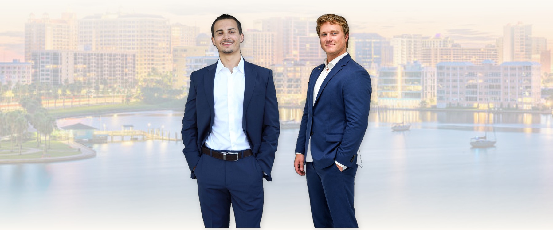 Ethan Walls and Sam Beaugrand — Co-Founders of Offer SRQ — standing in front of the Sarasota skyline